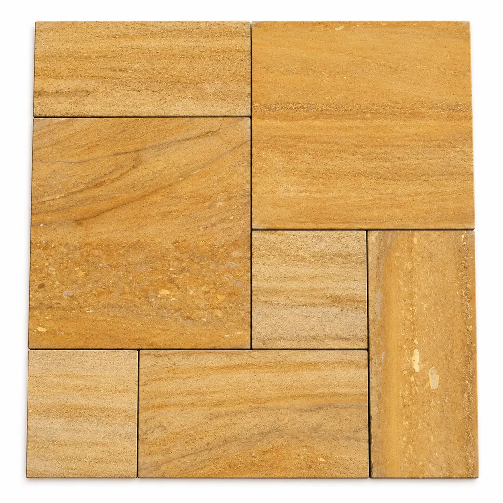 Ita Gold sandstone paving in mixed sizes with golden-yellow tones and flowing linear banding