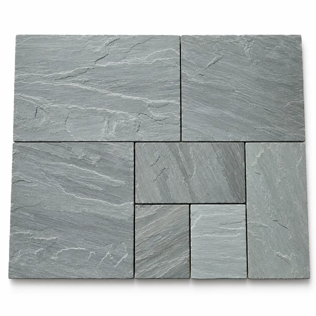 Kandla Grey sandstone paving in mixed sizes with a cool grey riven surface and fine white veining