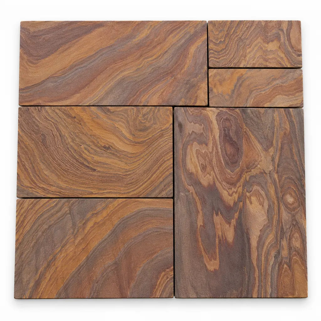 Rainbow sandstone paving in mixed sizes with swirling russet, brown, buff and mauve wood-grain bands