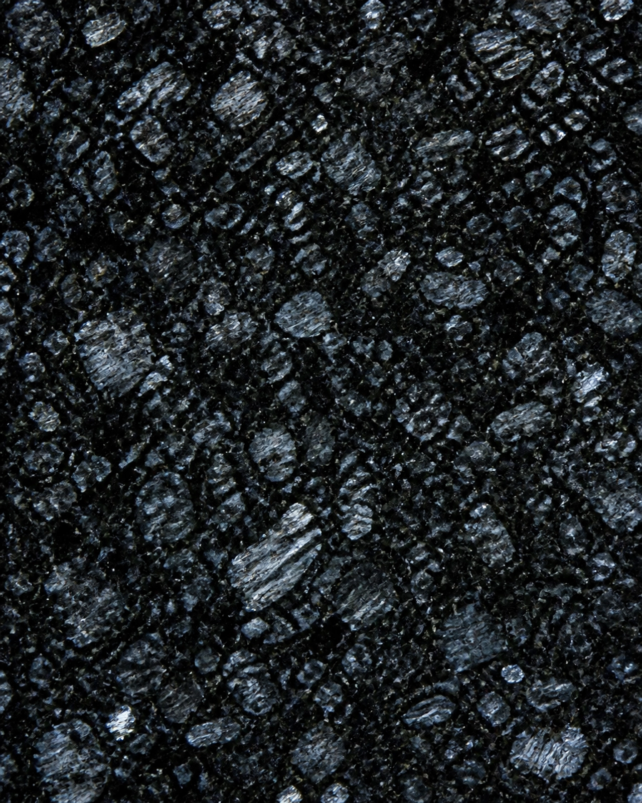 Jet Black Granite Secrets Revealed: What Experts Don’t Want You to Know 4 Close-up of Black Pearl Granite showing metallic silver flecks