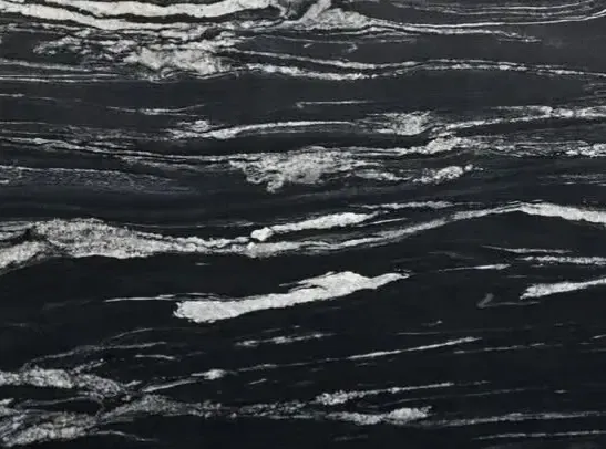 The Subtle Sophistication of Fish Black: Why Texture Trumps Flat Color in Modern Architecture 3 Close-up of a flamed and brushed Fish Black Granite surface showing the rugged, slip-resistant texture ideal for luxury outdoor pool decks and walkways
