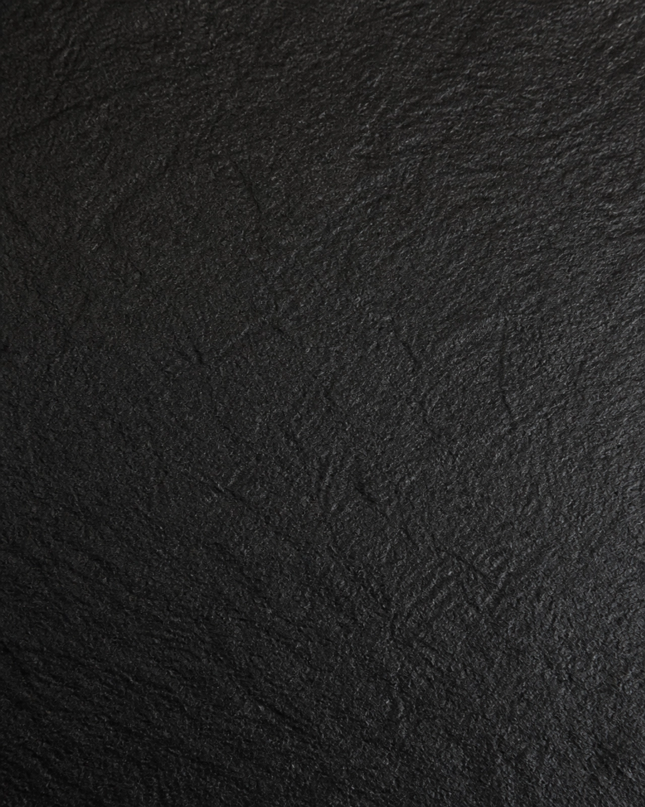 Absolute Black vs. Black Pearl Granite: Which Is Better For Your Project? 3 Leathered Finish on Black Granite