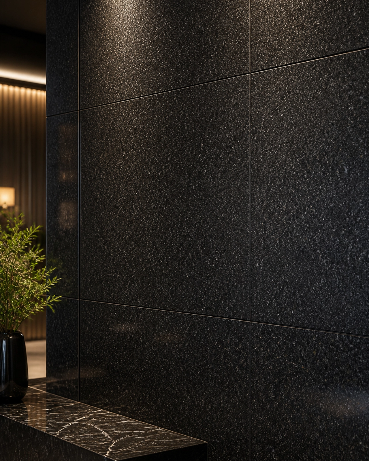 The Bold & The Beautiful: Statement Walls with Fish Black Granite 2 Architectural vertical feature wall in a hotel lobby made of polished Fish Black Granite slabs.