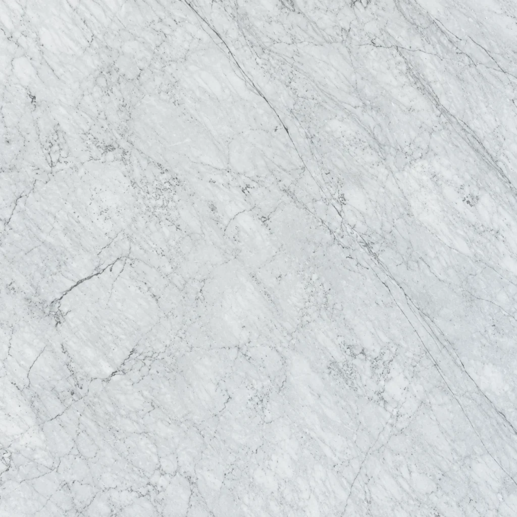 Bianco Carrara marble close-up: soft grey-white with fine grey veins